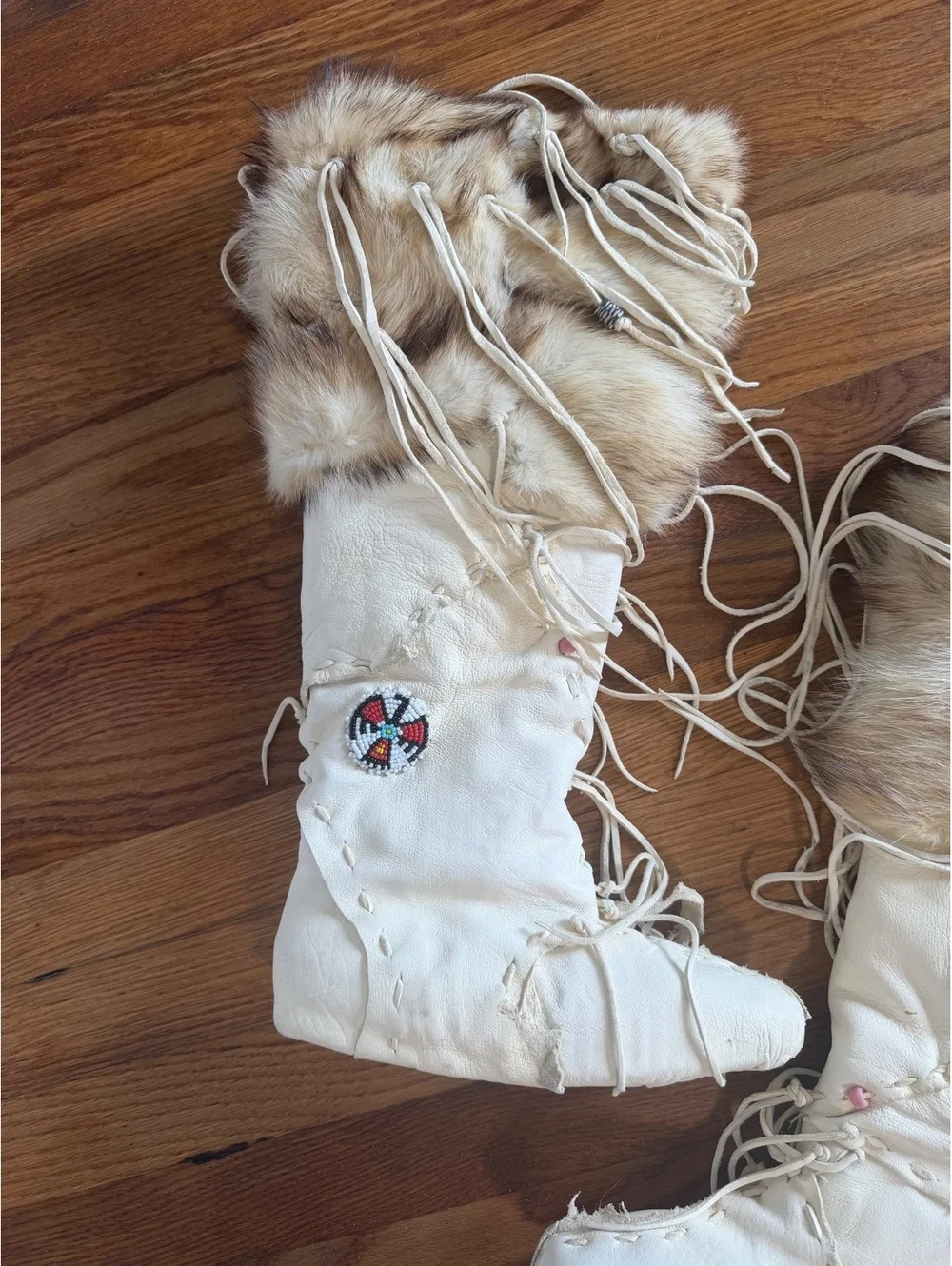 Handcrafted White Leather and Fur Moccasin Boots with Beaded Design